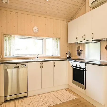 Semesterbostad Aakirkeby With A Fireplace 01